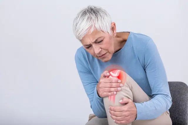 Senior woman suffering from Meniscal Tear